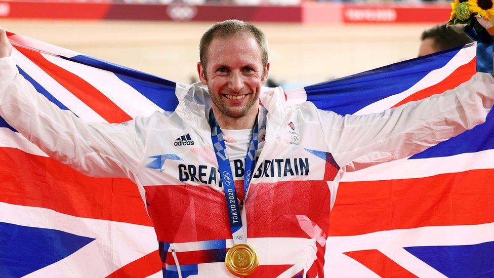 Jason Kenny with medal and flag