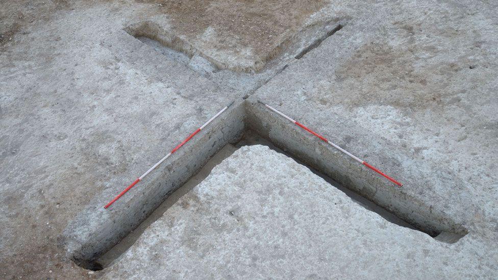 An X or cross-shape in the ground showing where medieval mill foundations once were, Cherry Hinton, Cambridgeshire