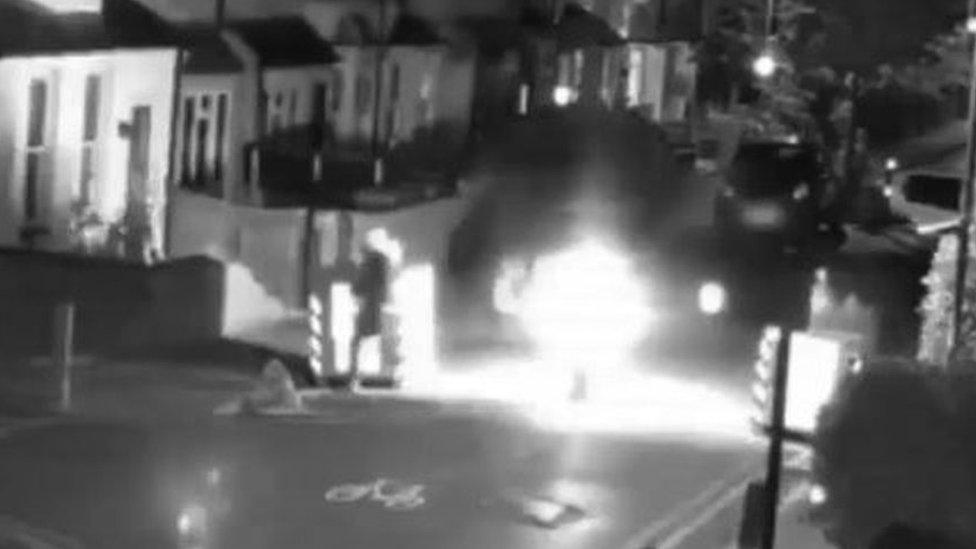 Howard Street bollard being set alight