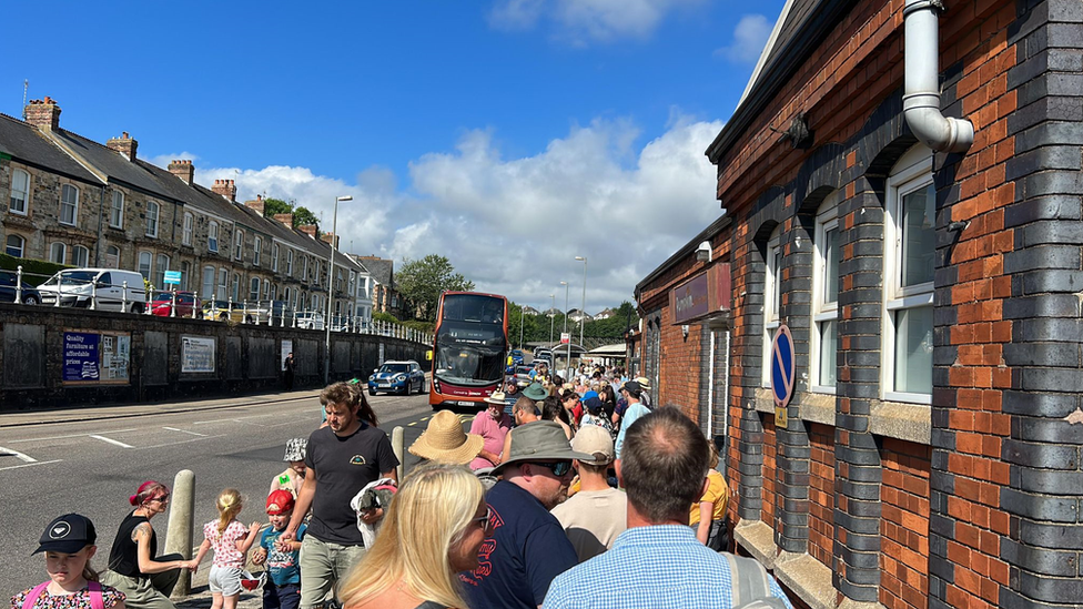 People queuing for the train