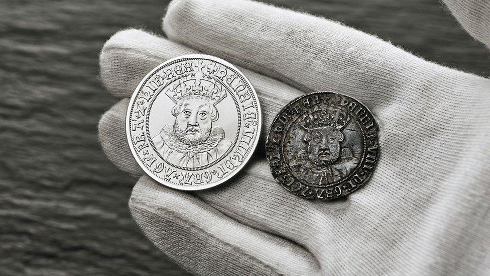 New coin with Henry the 8th's face on next to an old coin with his face on