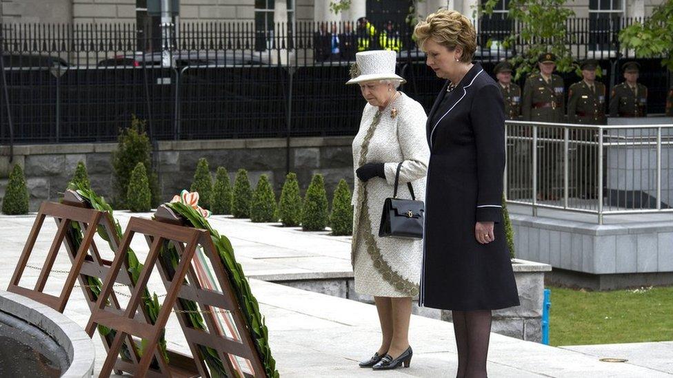 Irish President Mary McAleese and Queen Elizabeth II lay a wreath at Dublin Memorial Garden in May 2011