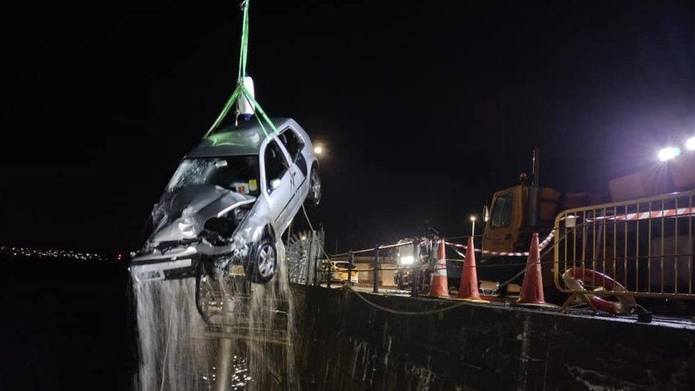 Car pulled out of harbour off Battery Pier