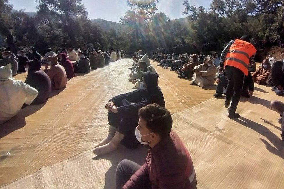 Mourners gather during the funeral of Rayan Oram who died after being trapped in a well, near Chefchaouen, Morocco, on 7 February 2022