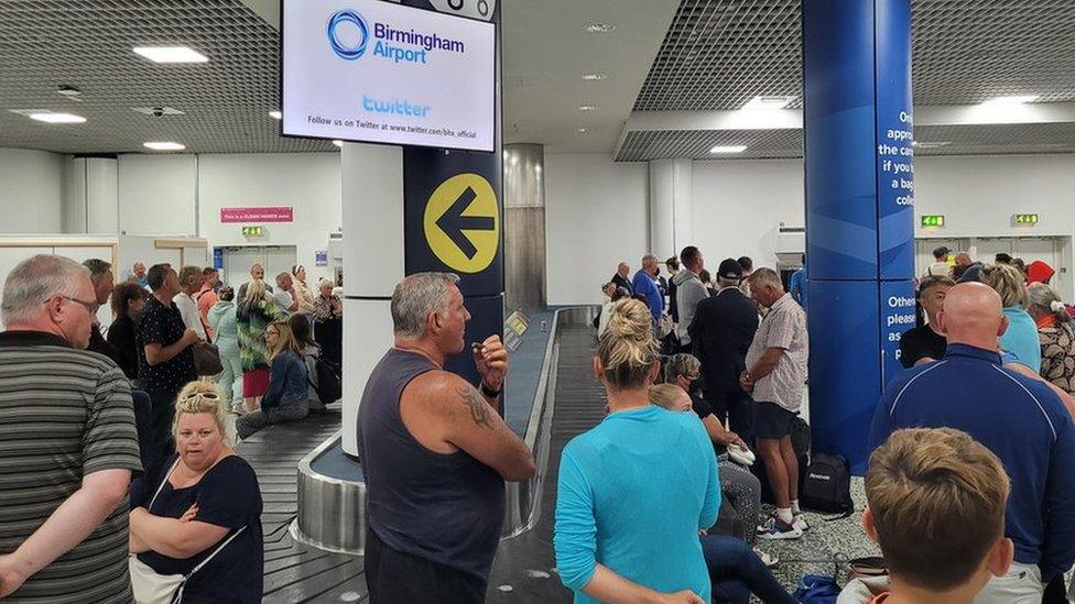 passengers at Birmingham Airport