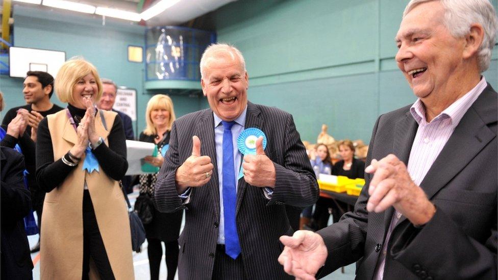 Conservative candidate for Chelmsford Central, Dick Madden, celebrates with colleagues after retaining his seat in the Essex County Council local elections