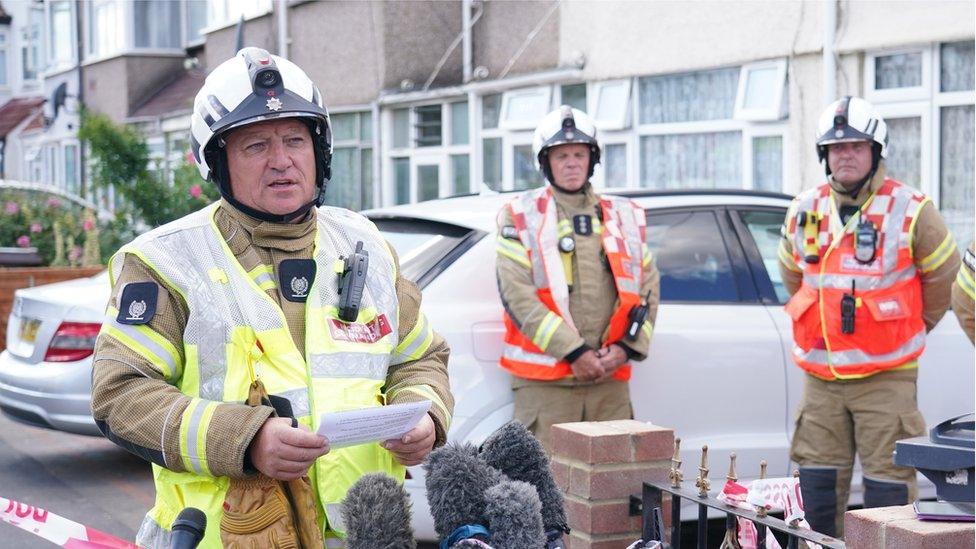 London Fire Brigade Deputy Assistant Commissioner Richard Welch, speaks to the media at the scene in Galpin's Road in Thornton Heath