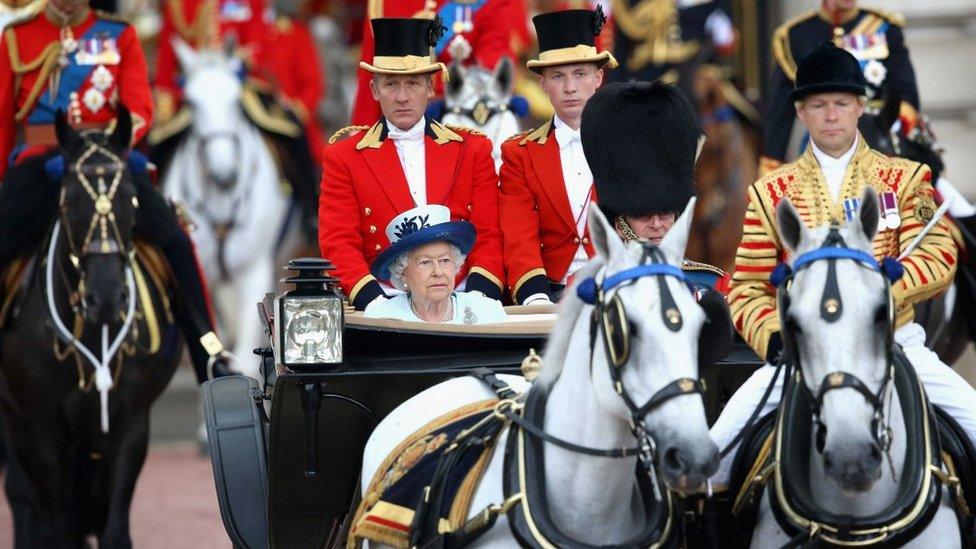 Close up of Daniel leading the Queen's carriage.