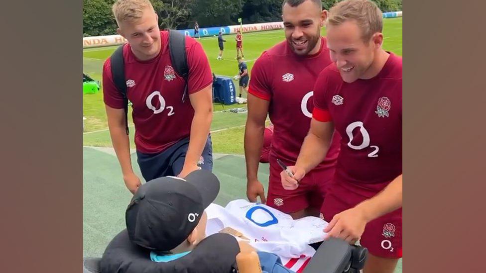 Charlie with members of the England Men's Rugby Union team