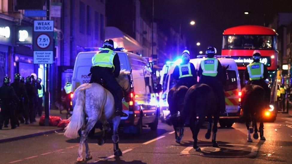 Riot police on horses