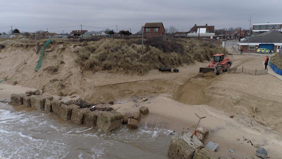 Digger on beach at Hemsby