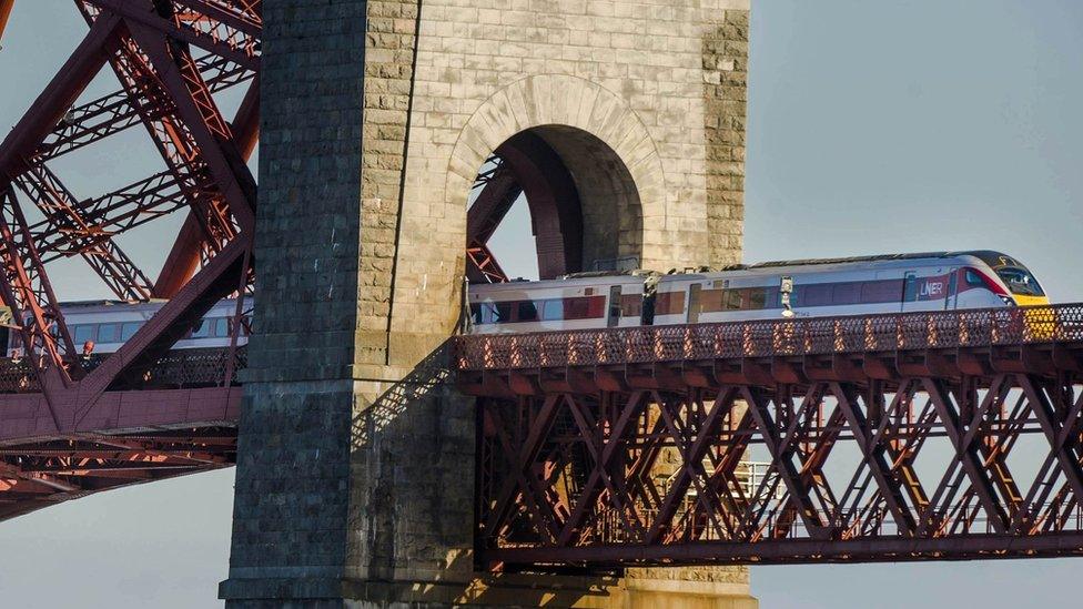 Hitachi Class 800 train crosses the Forth Bridge in Edinburgh