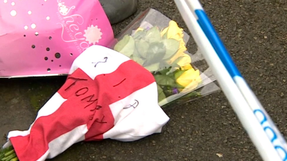 Floral tribute reading 'RIP Tommy' in Summers Street in Swindon