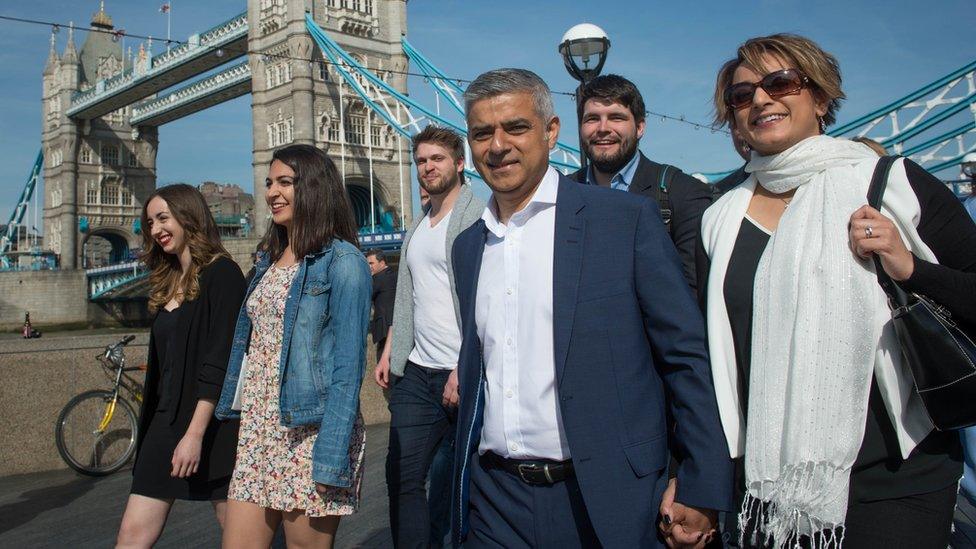 Sadiq Khan with his wife and campaign team near Tower Bridge on the day he became mayor