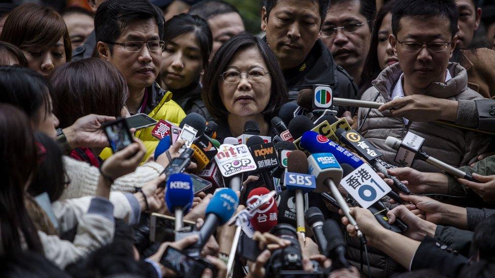 Democratic Progressive Party (DPP) presidential candidate Tsai Ing-wen, talks to journalists after casting her ballot at a polling station on January 16