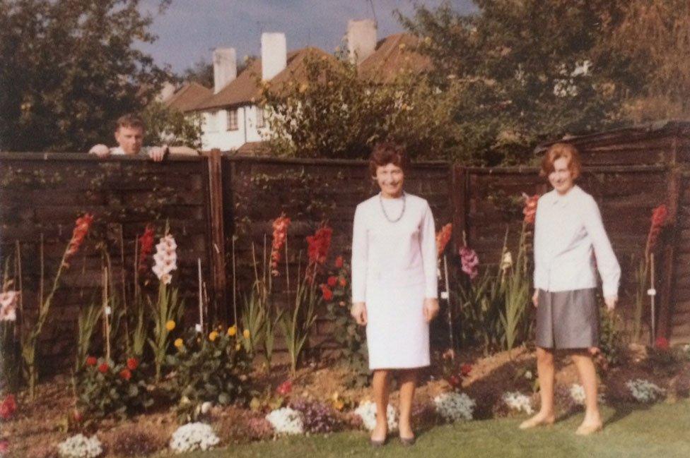 Wendy and her mum with her uncle looking over the fence. Taken in August 1966 - soon after Wendy moved next to her parents.