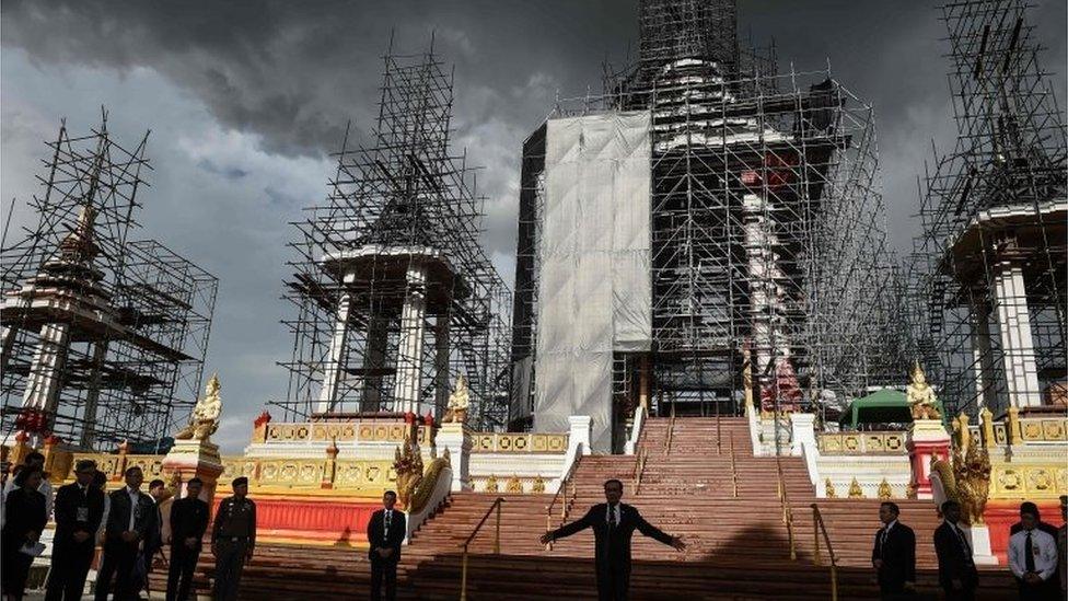 Thai PM Prayuth Chan-Ocha in front of the cremation structure for late King Bhumibol Adulyadej (13 July 2017)