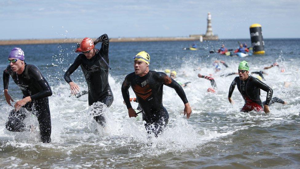 Great Britain's Max Stapley (left), Germany's Johannes Vogel (second from left) and Japan's Kenji Nener in action during the Elite Men's race on day one of the 2023 World Triathlon Series event at Roker Beach, Sunderland.