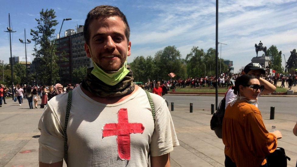 Nicolás Lecaros poses for a photo at Plaza Italia in Santiago