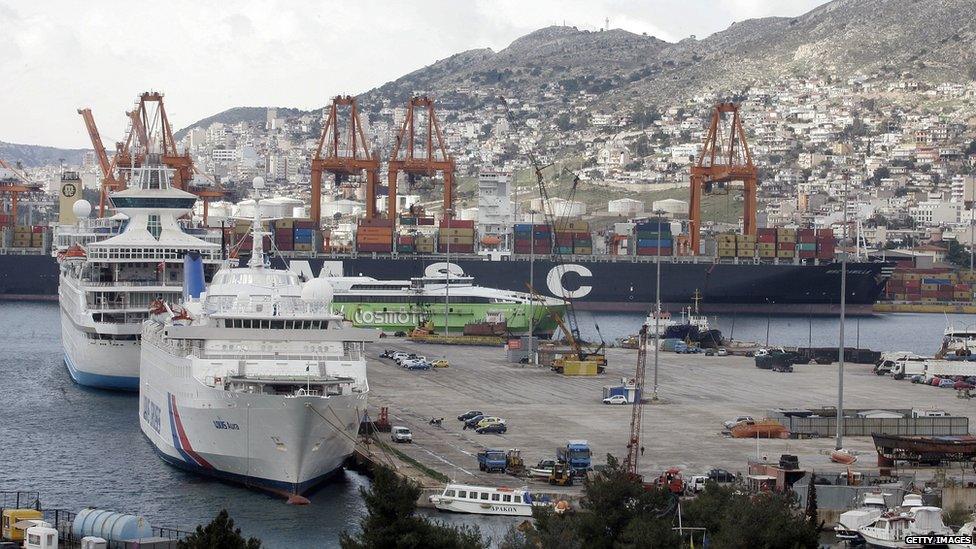 Shipping container cranes line the Pireaus cargo port on 11 February 2015 in Pireaus,