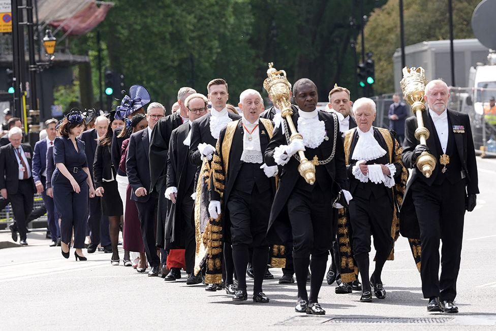 MPs and peers walk in procession from the Palace of Westminster in London to Westminster Abbey for a Service of Thanksgiving on the 80th anniversary of VE Day.
