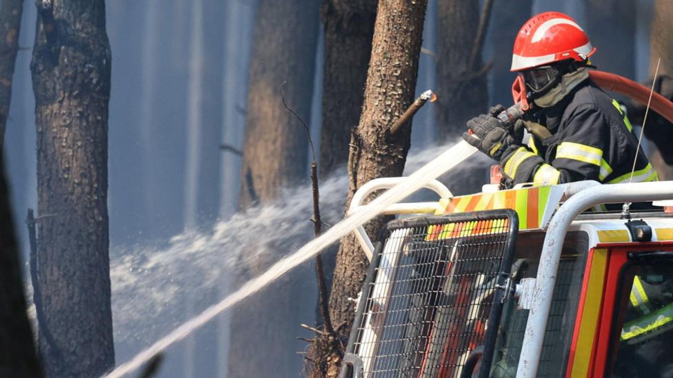 France fire crews face searing heat in battle to contain flames