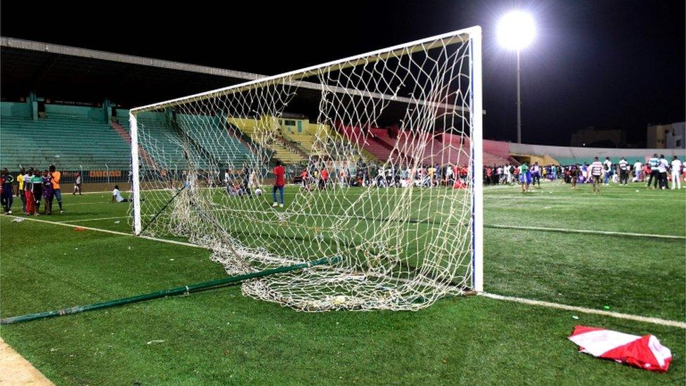 Damaged goalposts after unrest at the Demba Diop stadium