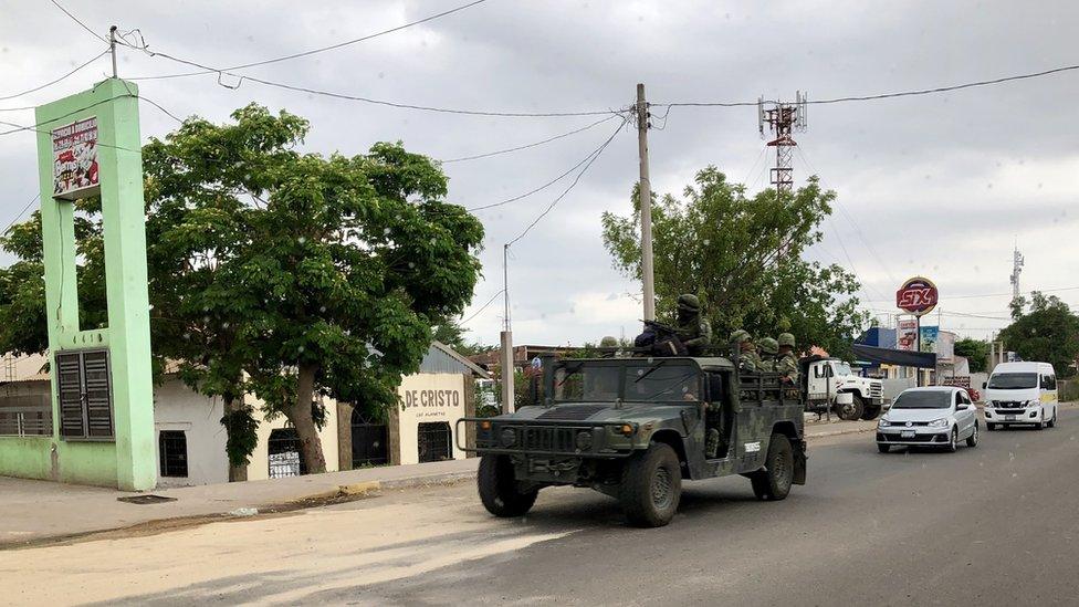 Soldiers patrol the streets of Culiacan