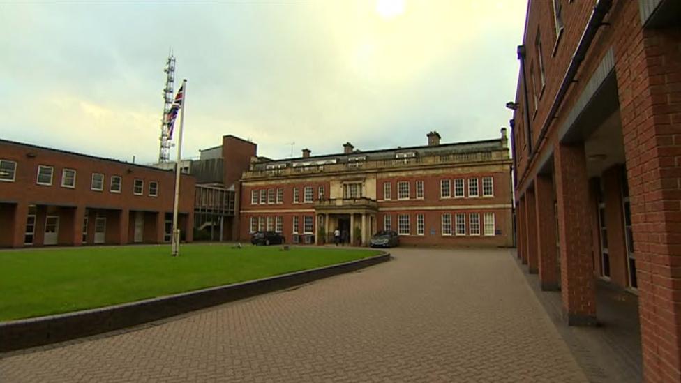 Northamptonshire Police HQ - a 19th century manor house with a grass courtyard