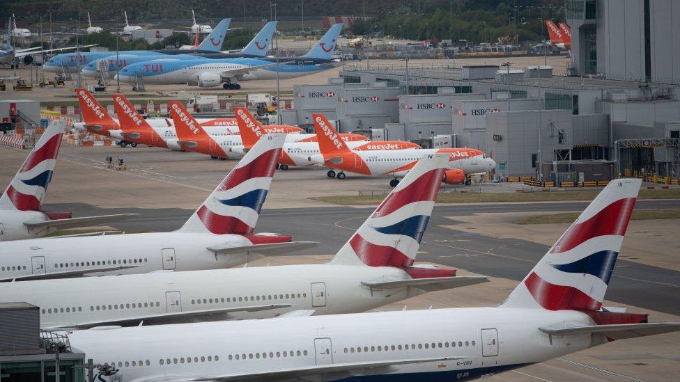 BA, Easyjet and TUI planes on the runway