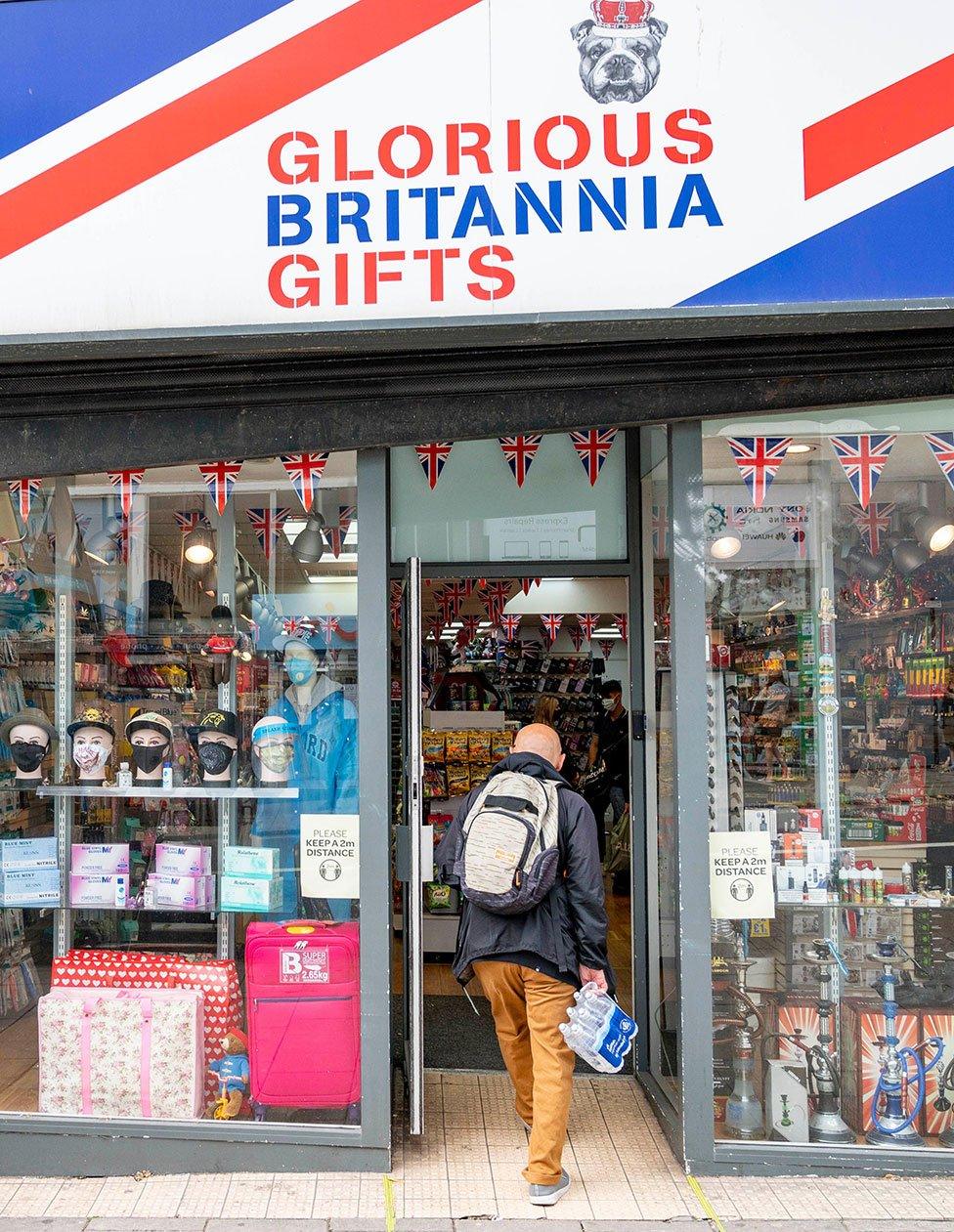 A customer enters a gift shop