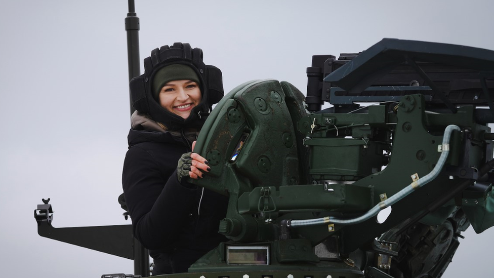 Natalya Sad in a tank