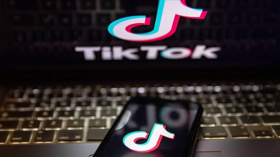 TikTok logo and screen