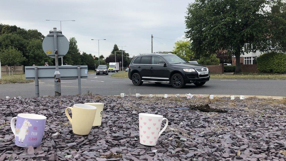 Teacups and mugs on a roundabout