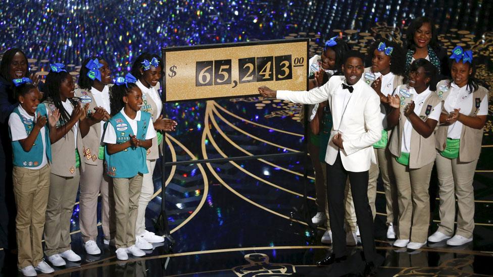 Chris Rock reveals that $65,243 USD was raised when Girls Scouts of the USA sold cookies to the Oscars audience