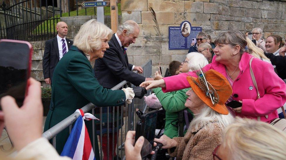 King Charles and the Queen Consort meet members of the public outside Dunfermline Abbey