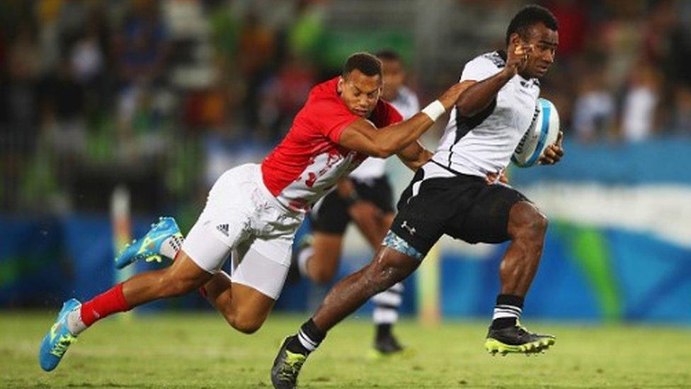 Leone Nakarawa of Fiji is tackled by Dan Norton of Great Britain during the Men's Rugby Sevens Gold medal final match between Fiji and Great Britain