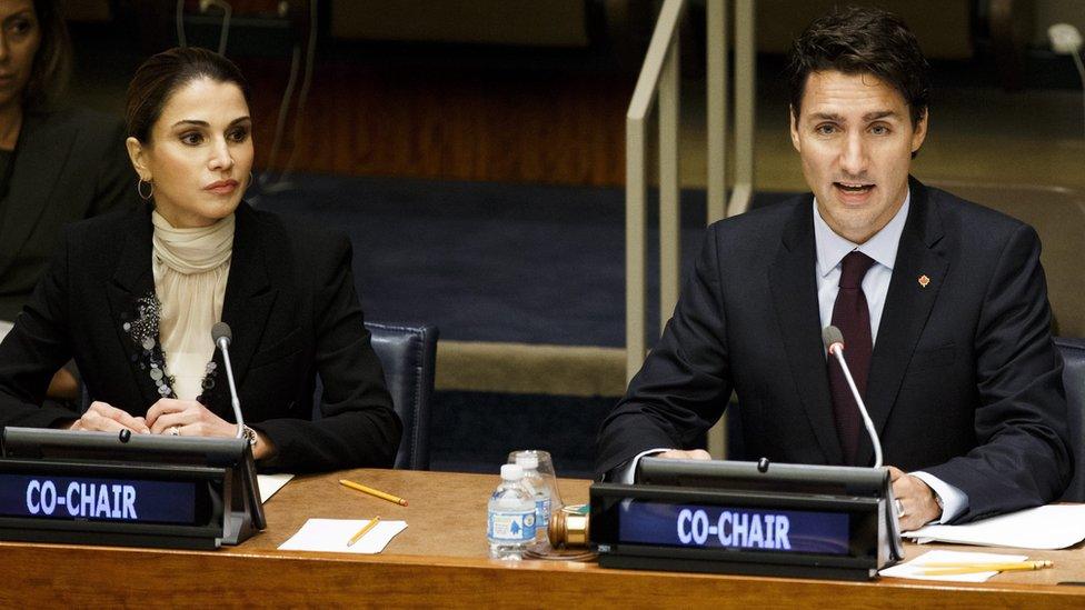 Justin Trudeau (R), Prime Minister of Canada, speaks as Her Majesty Queen Rania Al-Abdullah of Jordan (L)