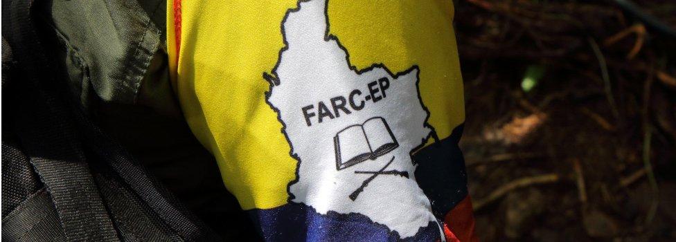 The Farc flag as seen on the uniform of a guerrilla fighter