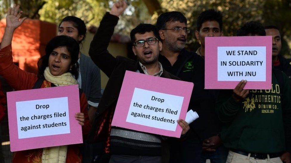 Indian students hold placards during a protest against the arrest of the president of Jawaharlal Nehru University's Student Union (JNU) Kanhaiya Kumar in New Delhi on February 14, 2016.