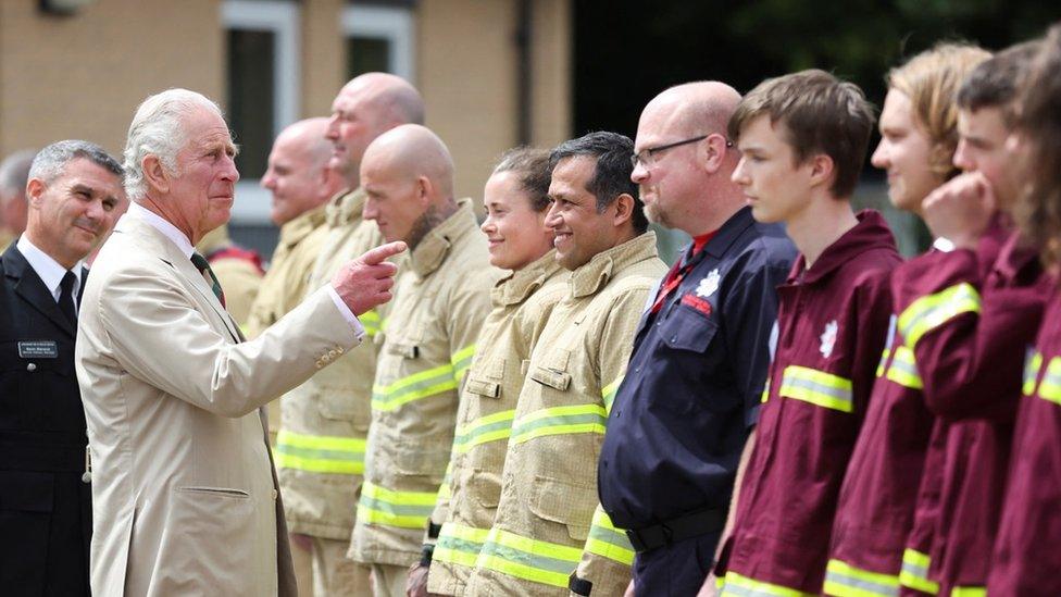 The Prince of Wales meeting firefighters during a visit to Morecambe Fire Station