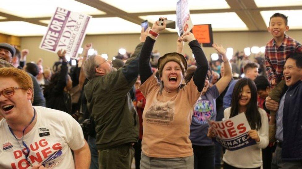 Supporters of Doug Jones celebrate at the election night in Birmingham, Alabama.