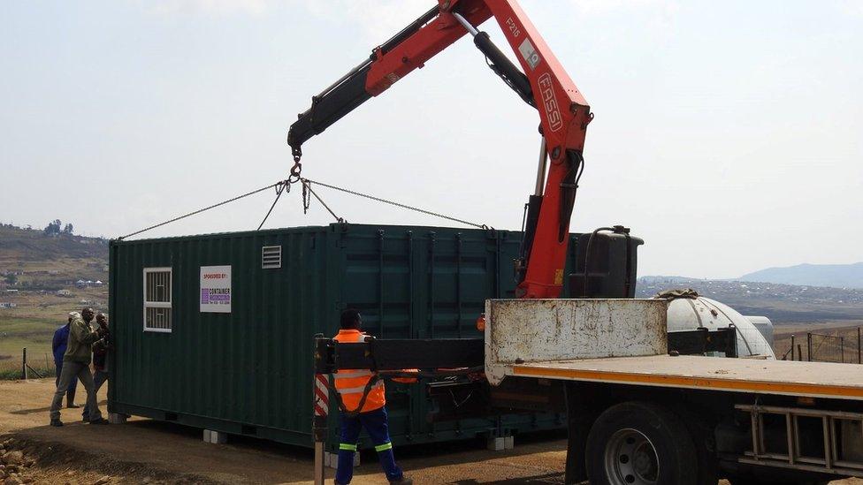 A container full of equipment has been transported overseas