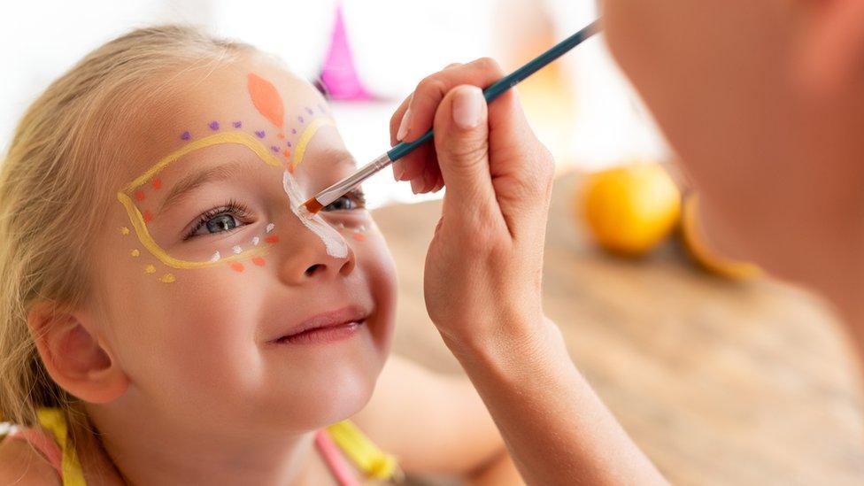 Child-getting-face-painted.