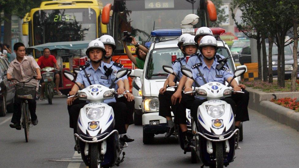 Police patrol on motorcycles in Xian