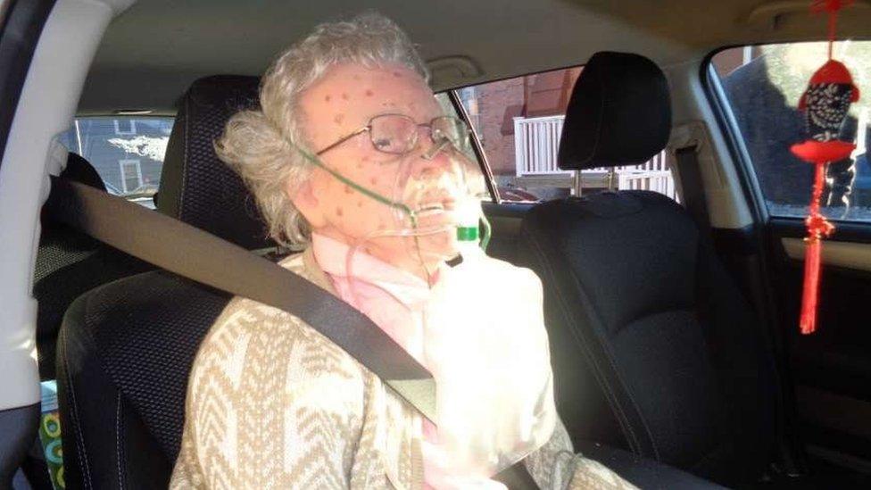 Lifelike mannequin in car