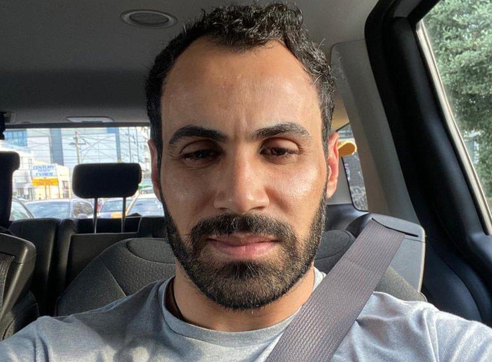 Hossein Latifi pictured in a vehicle with a seatbelt on