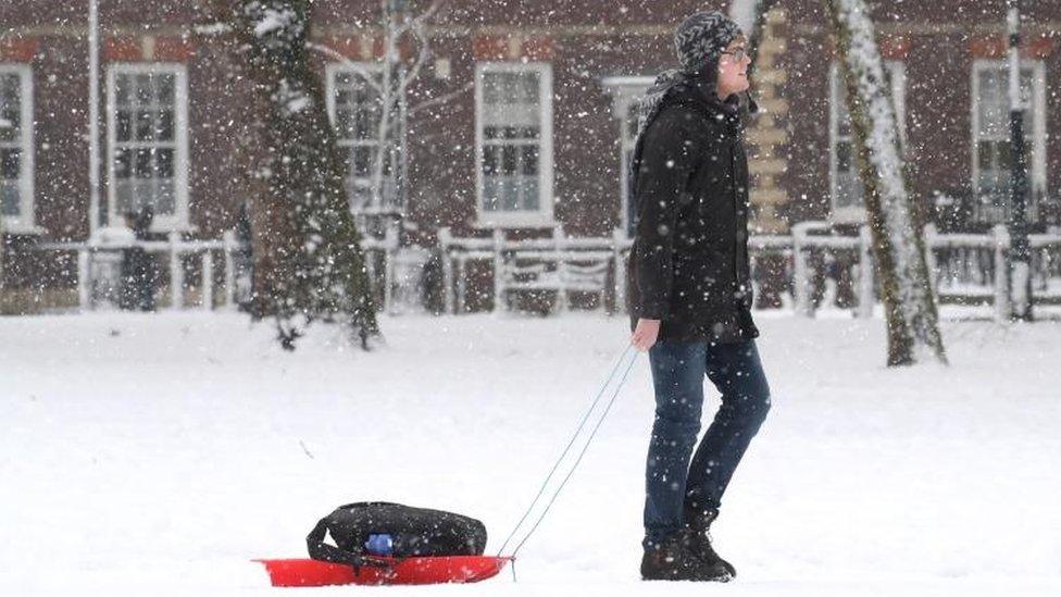 Man with sledge