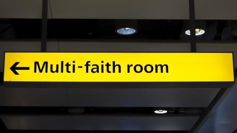 Sign pointing to multi-faith room