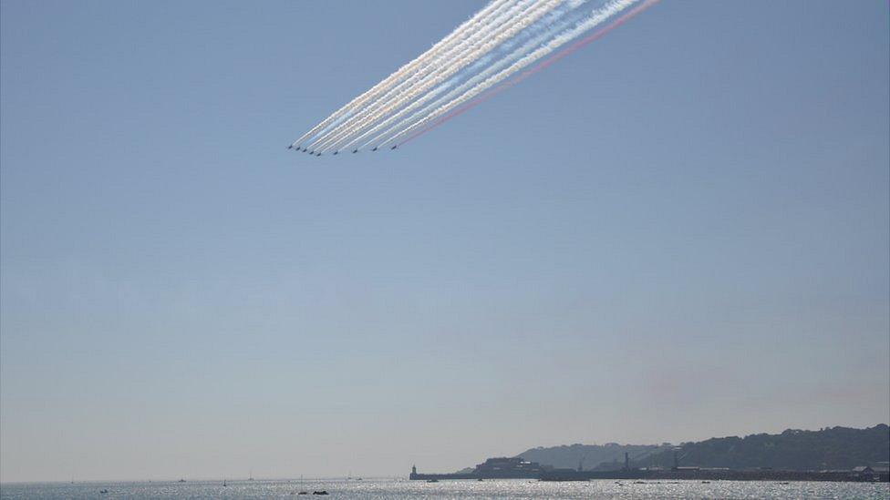 Red Arrows perform a flypast in the honour of Guernsey's lieutenant governor